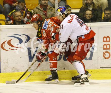 EBEL. Eishockey Bundesliga. KAC gegen EC Red Bull Salzburg. GEIER Manuel Geier (KAC), REGIER Steven (Salzburg). Klagenfurt, am 28.2.2010.
Foto: Kuess 

---
pressefotos, pressefotografie, kuess, qs, qspictures, sport, bild, bilder, bilddatenbank