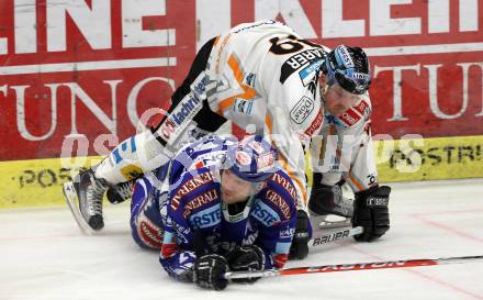 EBEL. Eishockey Bundesliga. EC Pasut VSV gegen EHC LIWEST Linz.  Mickey Elick, (VSV),   Robert Shearer (Linz). Villach, am 28.2.2010.
Foto: Kuess 


---
pressefotos, pressefotografie, kuess, qs, qspictures, sport, bild, bilder, bilddatenbank