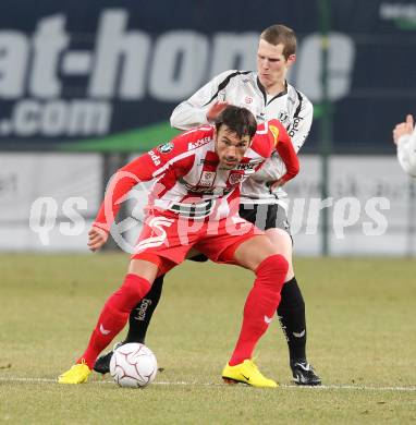 Fussball. Tipp3-Bundesliga. SK Austria Kelag Kaernten  gegen KSV Superfund Kapfenberger SV. Daniel Gramann (Austria Kaernten), Srdjan Pavlov (Kapfenberg). Klagenfurt, 27.2.2010. 
Foto: Kuess

---
pressefotos, pressefotografie, kuess, qs, qspictures, sport, bild, bilder, bilddatenbank