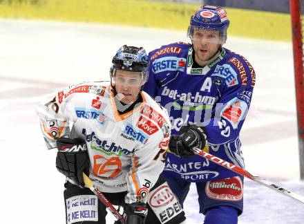 EBEL. Eishockey Bundesliga. EC Pasut VSV gegen EHC LIWEST Linz.  Mickey Elick, (VSV),  Gregor Baumgartner (Linz). Villach, am 28.2.2010.
Foto: Kuess 


---
pressefotos, pressefotografie, kuess, qs, qspictures, sport, bild, bilder, bilddatenbank