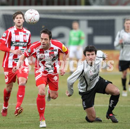 Fussball. Tipp3-Bundesliga. SK Austria Kelag Kaernten  gegen KSV Superfund Kapfenberger SV. Goran Aleksic (Austria Kaernten), Andreas Rauscher (Kapfenberg). Klagenfurt, 27.2.2010. 
Foto: Kuess

---
pressefotos, pressefotografie, kuess, qs, qspictures, sport, bild, bilder, bilddatenbank