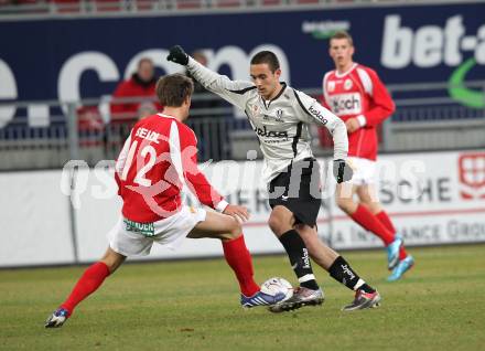 Fussball BUndesliga. SK Austria Kaernten gegen SV Mattersburg. Markus Pink (Kaernten), Manuel Seidl (Mattersburg). Klagenfurt, am 6.2.2010.
Foto: Kuess
---
pressefotos, pressefotografie, kuess, qs, qspictures, sport, bild, bilder, bilddatenbank