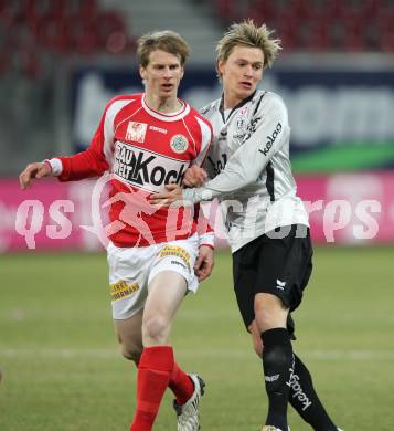 Fussball BUndesliga. SK Austria Kaernten gegen SV Mattersburg. Stefan Hierlaender (Kaernten), Michael Moerz (Mattersburg). Klagenfurt, am 6.2.2010.
Foto: Kuess
---
pressefotos, pressefotografie, kuess, qs, qspictures, sport, bild, bilder, bilddatenbank