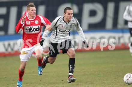 Fussball BUndesliga. SK Austria Kaernten gegen SV Mattersburg. Markus Pink (Kaernten), Dominik Doleschal (Mattersburg). Klagenfurt, am 6.2.2010.
Foto: Kuess
---
pressefotos, pressefotografie, kuess, qs, qspictures, sport, bild, bilder, bilddatenbank