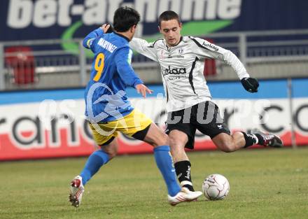 Fussball Stiegl OEFB Cup. SK Austria Kaernten gegen Fernwaerme Vienna. Markus Pink (Kaernten), Sebastian Martinez (Vienna). Klagenfurt, am 9.3.2010.
Foto: Kuess
---
pressefotos, pressefotografie, kuess, qs, qspictures, sport, bild, bilder, bilddatenbank