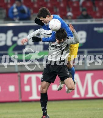 Fussball Stiegl OEFB Cup. SK Austria Kaernten gegen Fernwaerme Vienna. Goran Aleksic (Kaernten), Marcel Toth (Vienna). Klagenfurt, am 9.3.2010.
Foto: Kuess
---
pressefotos, pressefotografie, kuess, qs, qspictures, sport, bild, bilder, bilddatenbank