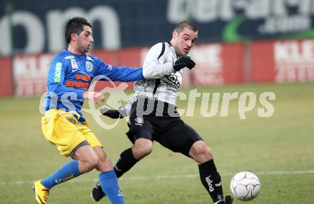 Fussball Stiegl OEFB Cup. SK Austria Kaernten gegen Fernwaerme Vienna. Marco Salvatore (Kaernten), Semsudin Mehic (Vienna). Klagenfurt, am 9.3.2010.
Foto: Kuess
---
pressefotos, pressefotografie, kuess, qs, qspictures, sport, bild, bilder, bilddatenbank