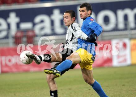 Fussball Stiegl OEFB Cup. SK Austria Kaernten gegen Fernwaerme Vienna.  Markus Pink (Kaernten), Mahmut Imamogli (Vienna). Klagenfurt, am 9.3.2010.
Foto: Kuess
---
pressefotos, pressefotografie, kuess, qs, qspictures, sport, bild, bilder, bilddatenbank