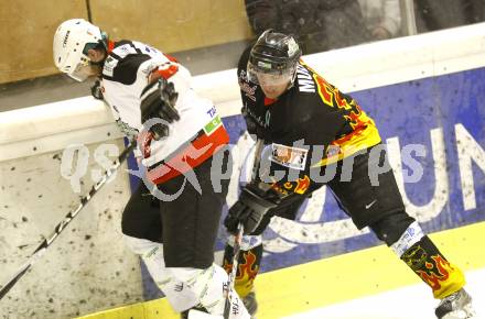 Eishockey Carinthian Hockey League CHL.  EC Tarco Woelfe Klagenfurt gegen EC SV Spittal. Andreas Moschik (Tarco), Thomas Mueller (Spittal). Klagenfurt, am 9.3.2010.
Foto: Kuess

---
pressefotos, pressefotografie, kuess, qs, qspictures, sport, bild, bilder, bilddatenbank