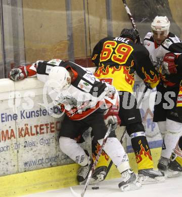 Eishockey Carinthian Hockey League CHL. EC Tarco Woelfe Klagenfurt gegen EC SV Spittal. Manuel Ferrara (Tarco), Michael Köll (Spittal). Klagenfurt, am 9.3.2010.
Foto: Kuess
---
pressefotos, pressefotografie, kuess, qs, qspictures, sport, bild, bilder, bilddatenbank
