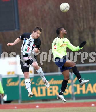 Fussball. Regionalliga. WAC/St. Andrae gegen SV Bad Aussee. Stefan Stueckler  (WAC/St. Andrae),  Oliver Teguia (Bad Aussee). Wolfsberg, 13.3.2010. 
Foto: Kuess

---
pressefotos, pressefotografie, kuess, qs, qspictures, sport, bild, bilder, bilddatenbank