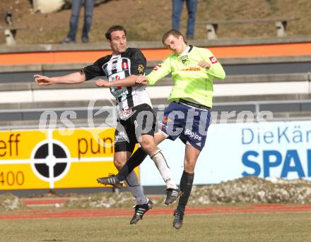 Fussball. Regionalliga. WAC/St. Andrae gegen SV Bad Aussee.  Marco Reich (WAC/St. Andrae),  Wolfgang Rath (Bad Aussee). Wolfsberg, 13.3.2010. 
Foto: Kuess

---
pressefotos, pressefotografie, kuess, qs, qspictures, sport, bild, bilder, bilddatenbank