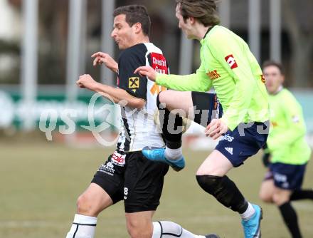 Fussball. Regionalliga. WAC/St. Andrae gegen SV Bad Aussee.  Thomas Pirker (WAC/St. Andrae),  Sebastian Chum (Bad Aussee). Wolfsberg, 13.3.2010. 
Foto: Kuess

---
pressefotos, pressefotografie, kuess, qs, qspictures, sport, bild, bilder, bilddatenbank