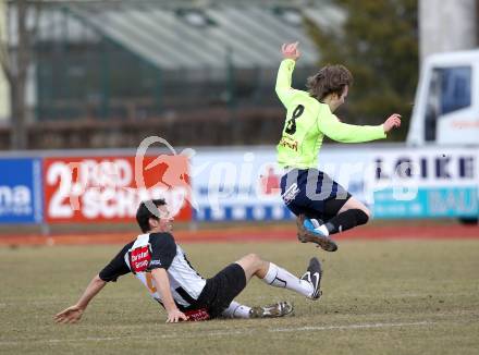 Fussball. Regionalliga. WAC/St. Andrae gegen SV Bad Aussee.  Bernd Kaintz (WAC/St. Andrae),  Sebastian Chum (Bad Aussee). Wolfsberg, 13.3.2010. 
Foto: Kuess

---
pressefotos, pressefotografie, kuess, qs, qspictures, sport, bild, bilder, bilddatenbank