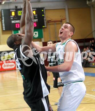 Basketball Bundesliga. Woerthersee Piraten gegen Guessing Knights.  Rasid Mahalbasic (Piraten), Yao O. D. Schaefer-tsahe  (Guessing Knights). Klagenfurt, 14.3.2010.
Foto:  Kuess

---
pressefotos, pressefotografie, kuess, qs, qspictures, sport, bild, bilder, bilddatenbank