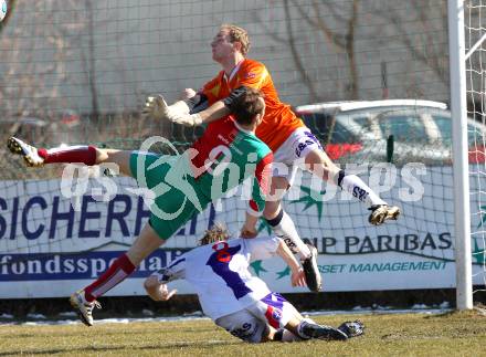 Fussball Regionalliga. SAK gegen Wels. Alexander Kofler, Christian Kraiger (SAK), Roidinger Mathias (Wels). Klagenfurt, 14.3.2010.
Foto: Kuess

---
pressefotos, pressefotografie, kuess, qs, qspictures, sport, bild, bilder, bilddatenbank