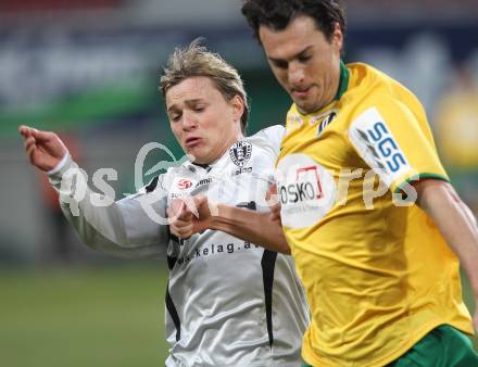 Fussball Bundesliga. SK Austria Kaernten gegen SV Josko Ried. Stefan Hierlaender (Kaernten), Thomas Burgstaller (Ried). Klagenfurt, am 20.3.2010.
Foto: Kuess
---
pressefotos, pressefotografie, kuess, qs, qspictures, sport, bild, bilder, bilddatenbank