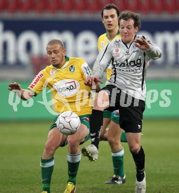 Fussball Bundesliga. SK Austria Kaernten gegen SV Josko Ried. Mario Kroepfl (Kaernten), Thomas Schrammel (Ried). Klagenfurt, am 20.3.2010.
Foto: Kuess
---
pressefotos, pressefotografie, kuess, qs, qspictures, sport, bild, bilder, bilddatenbank