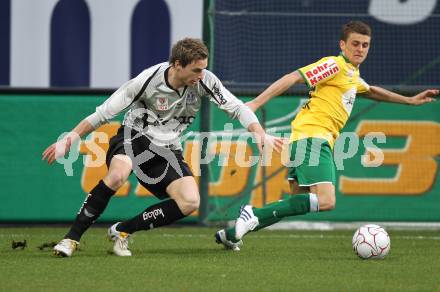 Fussball Bundesliga. SK Austria Kaernten gegen SV Josko Ried. Michael Sollbauer (Kaernten), Philipp Huspek (Ried). Klagenfurt, am 20.3.2010.
Foto: Kuess
---
pressefotos, pressefotografie, kuess, qs, qspictures, sport, bild, bilder, bilddatenbank