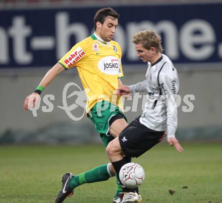 Fussball Bundesliga. SK Austria Kaernten gegen SV Josko Ried. Peter Pucker (Kaernten), Atdhe Nuhiu (Ried). Klagenfurt, am 20.3.2010.
Foto: Kuess
---
pressefotos, pressefotografie, kuess, qs, qspictures, sport, bild, bilder, bilddatenbank