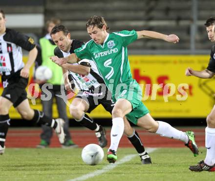 Fussball Regionalliga. SK St. Andrae/Lavanttal gegen FC Superfund Pasching. Hannes Franz Jochum (St. Andrae/Lavanttal), Marc Robert Sand (Pasching). Wolfsberg, 26.3.2010.
Foto: Kuess
---
pressefotos, pressefotografie, kuess, qs, qspictures, sport, bild, bilder, bilddatenbank