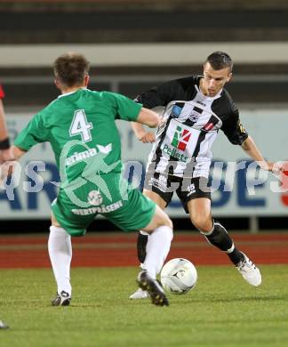 Fussball Regionalliga. SK St. Andrae/Lavanttal gegen FC Superfund Pasching. Devid Stanisavljevic (St. Andrae/Lavanttal), Bozo Kovacevic(Pasching). Wolfsberg, 26.3.2010.
Foto: Kuess
---
pressefotos, pressefotografie, kuess, qs, qspictures, sport, bild, bilder, bilddatenbank