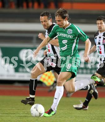 Fussball Regionalliga. SK St. Andrae/Lavanttal gegen FC Superfund Pasching. Hannes Franz Jochum  (St. Andrae/Lavanttal), Marc Robert Sand (Pasching). Wolfsberg, 26.3.2010.
Foto: Kuess
---
pressefotos, pressefotografie, kuess, qs, qspictures, sport, bild, bilder, bilddatenbank