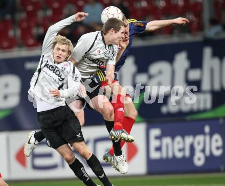 Fussball Bundesliga. SK Austria Kaernten gegen SK Rapid Wien. Stefan Hierlaender, Daniel Gramann (Kaernten), Nikica Jelavic (Rapid). Klagenfurt, am 27.3.2010.
Foto: Kuess
---
pressefotos, pressefotografie, kuess, qs, qspictures, sport, bild, bilder, bilddatenbank