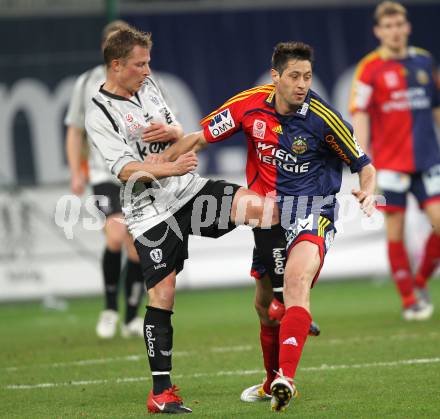 Fussball Bundesliga. SK Austria Kaernten gegen SK Rapid Wien. Thomas Riedl (Kaernten), Branko Boskovic (Rapid). Klagenfurt, am 27.3.2010.
Foto: Kuess
---
pressefotos, pressefotografie, kuess, qs, qspictures, sport, bild, bilder, bilddatenbank