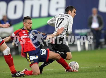 Fussball Bundesliga. SK Austria Kaernten gegen SK Rapid Wien. Leonhard Kaufmann (Kaernten), Veli Kavlak (Rapid). Klagenfurt, am 27.3.2010.
Foto: Kuess
---
pressefotos, pressefotografie, kuess, qs, qspictures, sport, bild, bilder, bilddatenbank