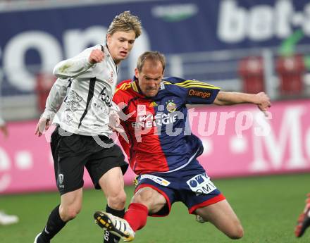 Fussball Bundesliga. SK Austria Kaernten gegen SK Rapid Wien. Stefan Hierlaender (Kaernten), Juergen Patocka (Rapid). Klagenfurt, am 27.3.2010.
Foto: Kuess
---
pressefotos, pressefotografie, kuess, qs, qspictures, sport, bild, bilder, bilddatenbank