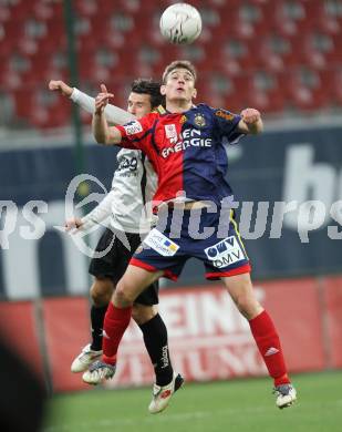 Fussball Bundesliga. SK Austria Kaernten gegen SK Rapid Wien. Luka Elsner (Kaernten), Nikica Jelavic (Rapid). Klagenfurt, am 27.3.2010.
Foto: Kuess
---
pressefotos, pressefotografie, kuess, qs, qspictures, sport, bild, bilder, bilddatenbank