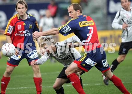 Fussball Bundesliga. SK Austria Kaernten gegen SK Rapid Wien. Stefan Hierlaender (Kaernten), Juergen Patocka (Rapid). Klagenfurt, am 27.3.2010.
Foto: Kuess
---
pressefotos, pressefotografie, kuess, qs, qspictures, sport, bild, bilder, bilddatenbank