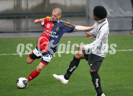 Fussball. OEFB Stiegl Cup. SK Austria Kelag Kaernten  gegen Rapid Wien. Sandro Ferreira Da Silva, (Austria Kaernten),  Stefan Kulovits (Rapid Wien). Klagenfurt, 31.3.2010. 
Foto: Kuess

---
pressefotos, pressefotografie, kuess, qs, qspictures, sport, bild, bilder, bilddatenbank