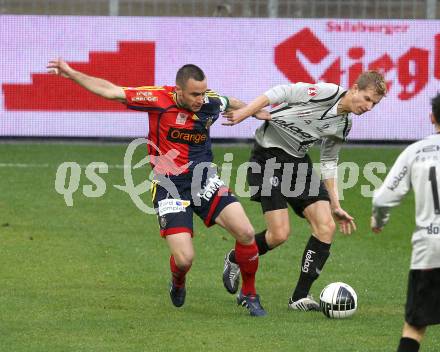 Fussball. OEFB Stiegl Cup. SK Austria Kelag Kaernten  gegen Rapid Wien. Thomas Hinum, (Austria Kaernten), Steffen Hofmann (Rapid Wien). Klagenfurt, 31.3.2010. 
Foto: Kuess

---
pressefotos, pressefotografie, kuess, qs, qspictures, sport, bild, bilder, bilddatenbank