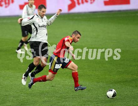 Fussball. OEFB Stiegl Cup. SK Austria Kelag Kaernten  gegen Rapid Wien. Oliver Pusztai, (Austria Kaernten), Steffen Hofmann (Rapid Wien). Klagenfurt, 31.3.2010. 
Foto: Kuess

---
pressefotos, pressefotografie, kuess, qs, qspictures, sport, bild, bilder, bilddatenbank