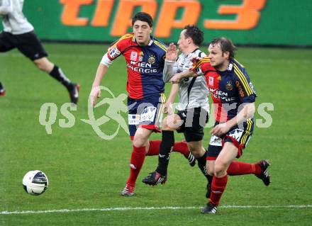 Fussball. OEFB Stiegl Cup. SK Austria Kelag Kaernten  gegen Rapid Wien. Matthias Dollinger, (Austria Kaernten), Yasin Pehlivan, Markus Heikkinen (Rapid Wien). Klagenfurt, 31.3.2010. 
Foto: Kuess

---
pressefotos, pressefotografie, kuess, qs, qspictures, sport, bild, bilder, bilddatenbank