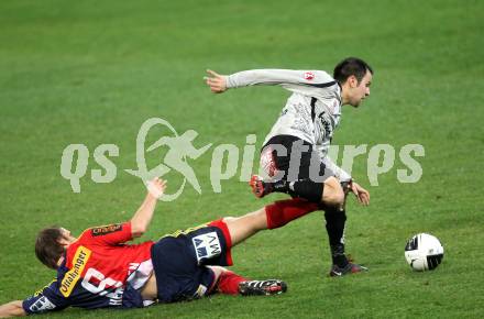 Fussball. OEFB Stiegl Cup. SK Austria Kelag Kaernten  gegen Rapid Wien. Leonhard Kaufmann, (Austria Kaernten), Markus Heikkinen (Rapid Wien). Klagenfurt, 31.3.2010. 
Foto: Kuess

---
pressefotos, pressefotografie, kuess, qs, qspictures, sport, bild, bilder, bilddatenbank