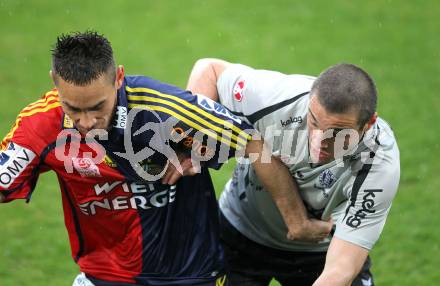 Fussball. OEFB Stiegl Cup. SK Austria Kelag Kaernten  gegen Rapid Wien. Marco Salvatore, (Austria Kaernten), Veli Kavlak (Rapid Wien). Klagenfurt, 31.3.2010. 
Foto: Kuess

---
pressefotos, pressefotografie, kuess, qs, qspictures, sport, bild, bilder, bilddatenbank