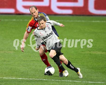 Fussball. OEFB Stiegl Cup. SK Austria Kelag Kaernten  gegen Rapid Wien. Stefan Hierlaender, (Austria Kaernten), Juergen Patocka (Rapid Wien). Klagenfurt, 31.3.2010. 
Foto: Kuess

---
pressefotos, pressefotografie, kuess, qs, qspictures, sport, bild, bilder, bilddatenbank