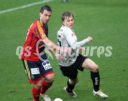 Fussball. OEFB Stiegl Cup. SK Austria Kelag Kaernten  gegen Rapid Wien. Stefan Hierlaender, (Austria Kaernten), Andreas Dober (Rapid Wien). Klagenfurt, 31.3.2010. 
Foto: Kuess

---
pressefotos, pressefotografie, kuess, qs, qspictures, sport, bild, bilder, bilddatenbank