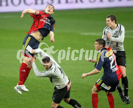 Fussball. OEFB Stiegl Cup. SK Austria Kelag Kaernten  gegen Rapid Wien. Oliver Pusztai, Daniel Gramann, (Austria Kaernten), Nikica Jelavic, Christopher Trimmel (Rapid Wien). Klagenfurt, 31.3.2010. 
Foto: Kuess

---
pressefotos, pressefotografie, kuess, qs, qspictures, sport, bild, bilder, bilddatenbank