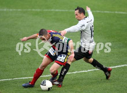 Fussball. OEFB Stiegl Cup. SK Austria Kelag Kaernten  gegen Rapid Wien. Matthias Dollinger, (Austria Kaernten),  Steffen Hofmann (Rapid Wien). Klagenfurt, 31.3.2010. 
Foto: Kuess

---
pressefotos, pressefotografie, kuess, qs, qspictures, sport, bild, bilder, bilddatenbank