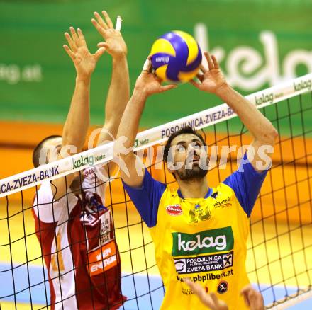 Volleyball. AVL-Halbfinale. SK Posojilnica Aich/Dob gegen hotVolleys. SMUC Tomislav (Aich/Dob), STOJKOVIC	Milos (hotVolleys). Prevalje, 1.4.2010
Foto: Kuess 

---
pressefotos, pressefotografie, kuess, qs, qspictures, sport, bild, bilder, bilddatenbank