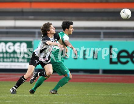 Fussball. Regionalliga. SK St. Andrae/Lavanttal gegen DSV Leoben. Falk Christian (St. Andrae), Boehmer David (Leoben). Wolfsberg, 9.4.2010. 
Foto: Kuess
---
pressefotos, pressefotografie, kuess, qs, qspictures, sport, bild, bilder, bilddatenbank