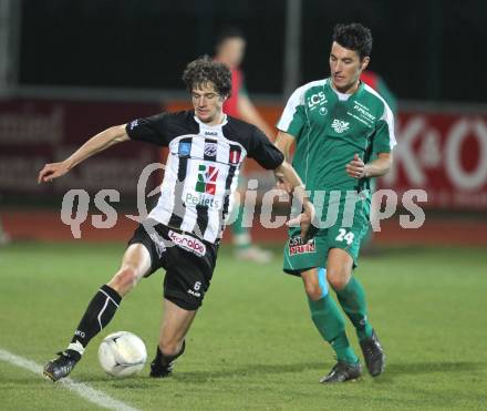 Fussball. Regionalliga. SK St. Andrae/Lavanttal gegen DSV Leoben. Christian Falk (St. Andrae), Boehmer David (Leoben). Wolfsberg, 9.4.2010. 
Foto: Kuess
---
pressefotos, pressefotografie, kuess, qs, qspictures, sport, bild, bilder, bilddatenbank