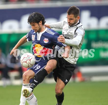 Fussball. Bundesliga. SK Austria Kelag Kaernten  gegen Red Bull Salzburg. Oliver Pusztai, (Austria Kaernten), Simon Cziommer (Salzburg). Klagenfurt, 10.4.2010. 
Foto: Kuess

---
pressefotos, pressefotografie, kuess, qs, qspictures, sport, bild, bilder, bilddatenbank