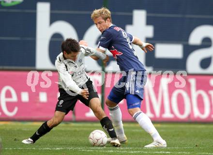 Fussball. Bundesliga. SK Austria Kelag Kaernten  gegen Red Bull Salzburg. Luka Elsner, (Austria Kaernten), Marc Janko (Salzburg). Klagenfurt, 10.4.2010. 
Foto: Kuess

---
pressefotos, pressefotografie, kuess, qs, qspictures, sport, bild, bilder, bilddatenbank