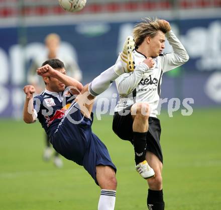 Fussball. Bundesliga. SK Austria Kelag Kaernten  gegen Red Bull Salzburg. Stefan Hierlaender, (Austria Kaernten), Milan Dudic (Salzburg). Klagenfurt, 10.4.2010. 
Foto: Kuess

---
pressefotos, pressefotografie, kuess, qs, qspictures, sport, bild, bilder, bilddatenbank