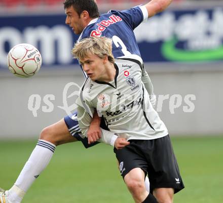 Fussball. Bundesliga. SK Austria Kelag Kaernten  gegen Red Bull Salzburg. Stefan Hierlaender, (Austria Kaernten), Milan Dudic (Salzburg). Klagenfurt, 10.4.2010. 
Foto: Kuess

---
pressefotos, pressefotografie, kuess, qs, qspictures, sport, bild, bilder, bilddatenbank